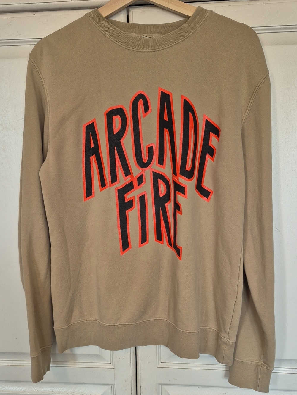 Arcade Beige Crewneck with Bold Black and Orange Logo